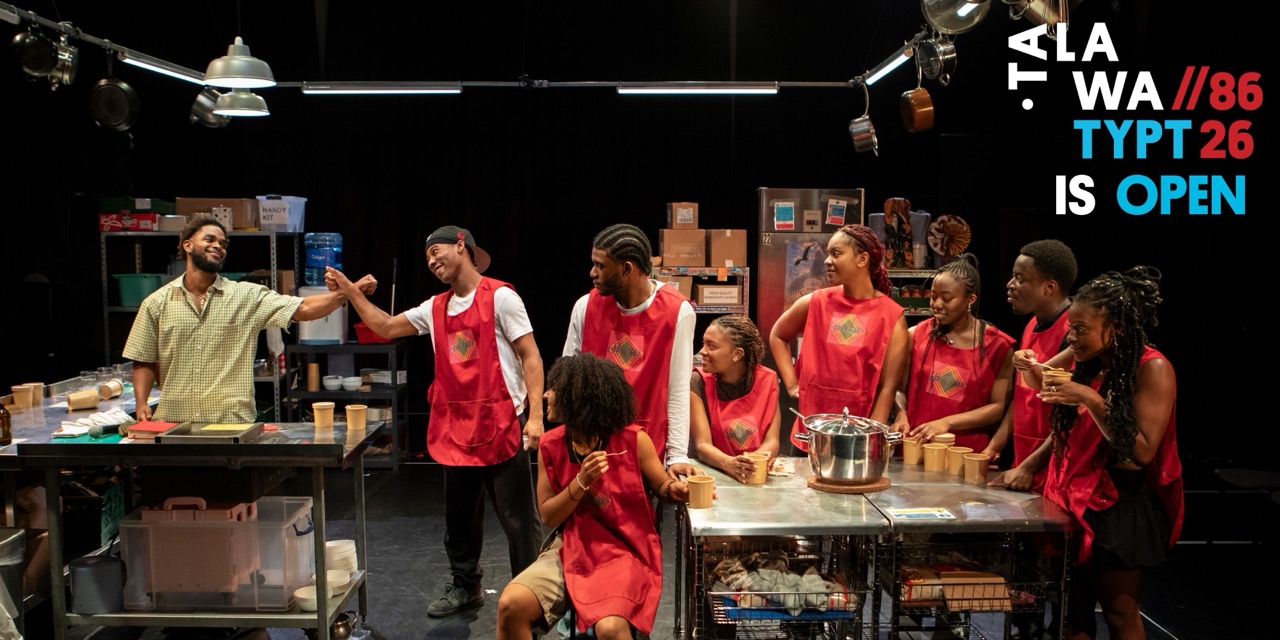 TYPT 25 Production - cast in a commercial kitchen with red aprons
